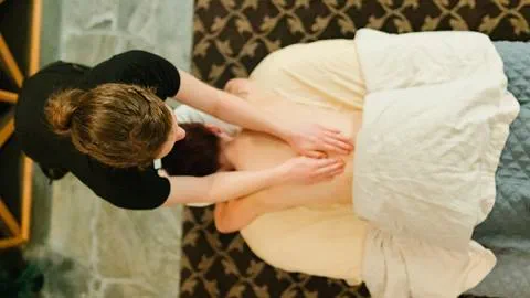 Masseuse giving massage at Solitude Mountain Spa