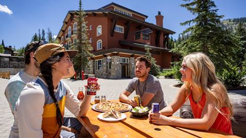 Friends enjoying drinks and lunch at Stone Haus at Solitude Mountain Resort