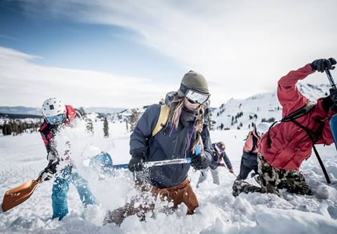 SAFE AS women's Clinic digging snow pits