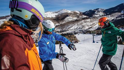 Ski instructor at Solitude using hands to demonstrate a turn