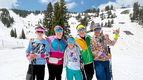 A group of friends celebrating closing day at Solitude Mountain Resort