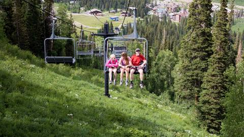 Scenic summer chairlift ride at Solitude Mountain Resort